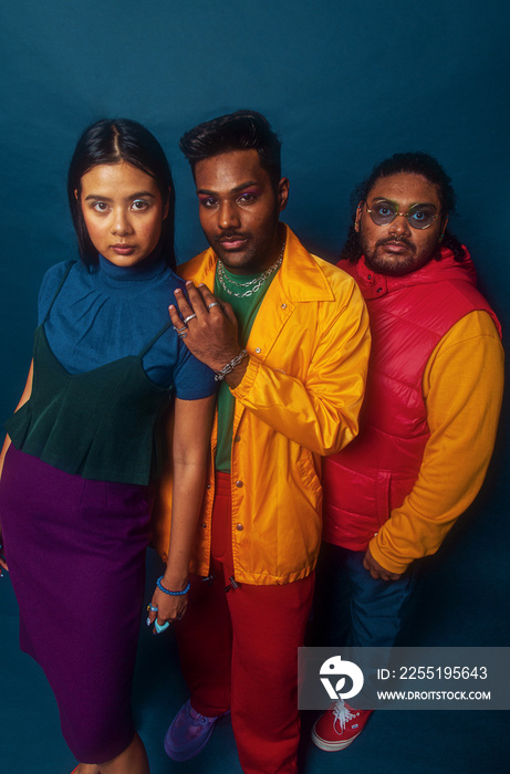 Trio fashion colour blocked studio portrait