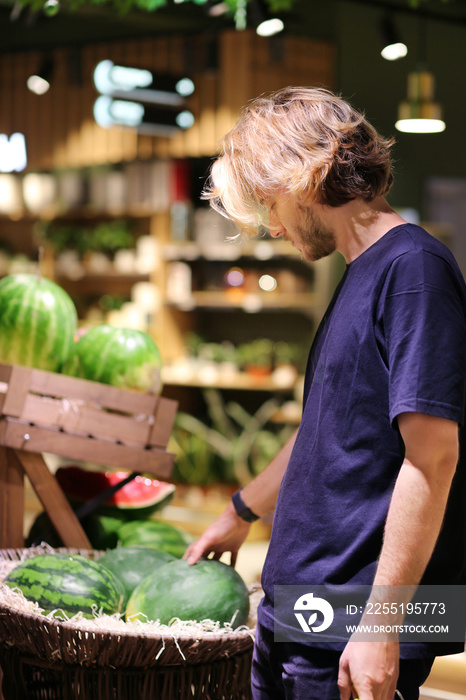 buying watermelon at the market