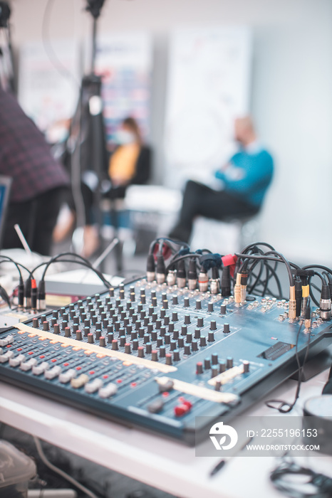 audio and video mixer closeup at streaming video meeting