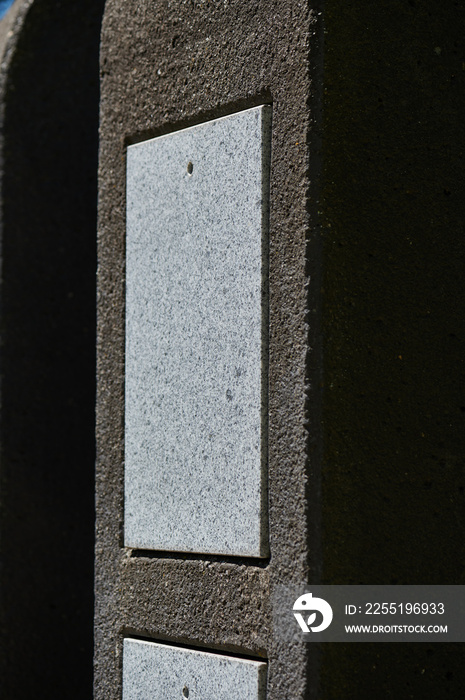 Close up of empty urn grave in cemetery