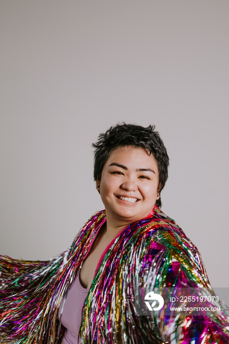 portrait of a plus size filipino woman smiling