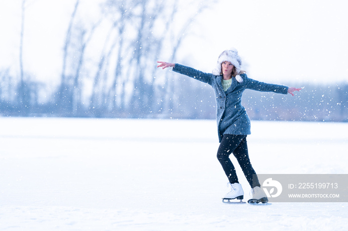 ice skating on a frozen pond in winter. banner