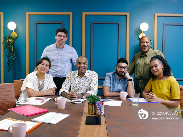 Group portrait of business people in office