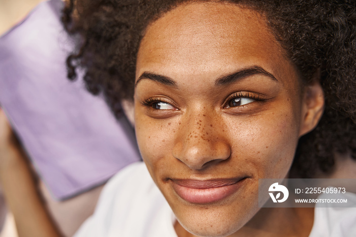 Portrait of relaxed beautiful lady smiling and looking happy