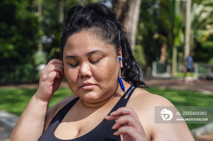 Plus size female getting ready for a run