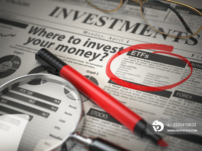 ETF is a best option to invest. Where to Invest concept, Investmets newspaper with loupe and marker.