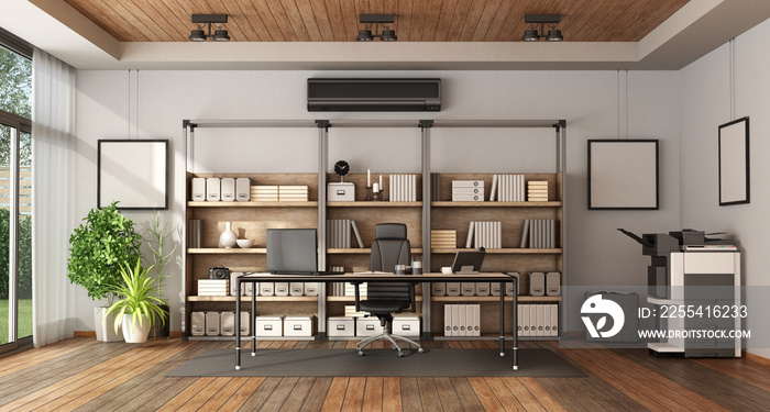 Modern office with bookcase and desk