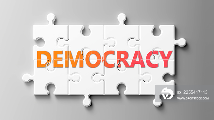 Democracy complex like a puzzle - pictured as word Democracy on a puzzle pieces to show that Democracy can be difficult and needs cooperating pieces that fit together, 3d illustration