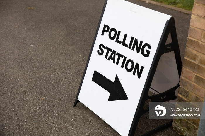 Polling station sign outside the entrance to a political voting location in UK