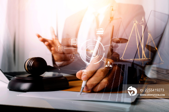 Male lawyer working with contract papers and wooden gavel on tabel in courtroom. justice and law ,attorney, court judge, concept.