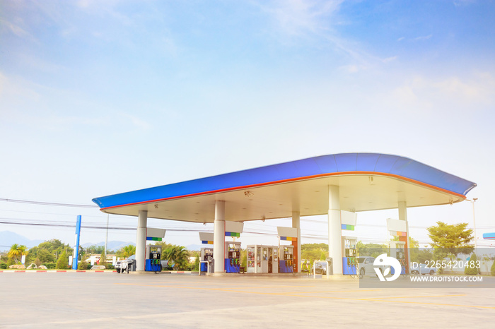 Petrol gas fuel station with clouds and blue sky