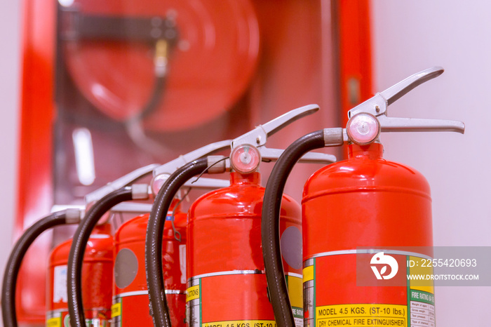 Red tank of fire extinguisher Overview of a powerful industrial fire extinguishing system.