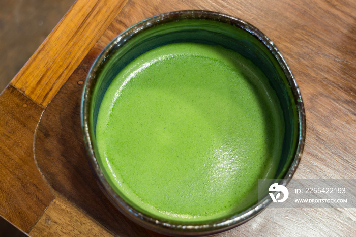 Bowl of hot matcha green tea drink