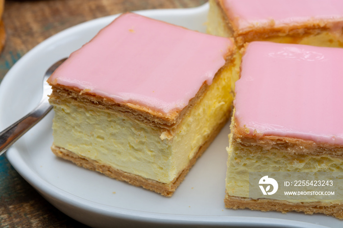 Tompoes or tompouce, iconic pastry in Netherlands and Belgium made from puff dough, icing, cream