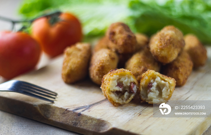 ham croquettes and cooked with vegetables in the background