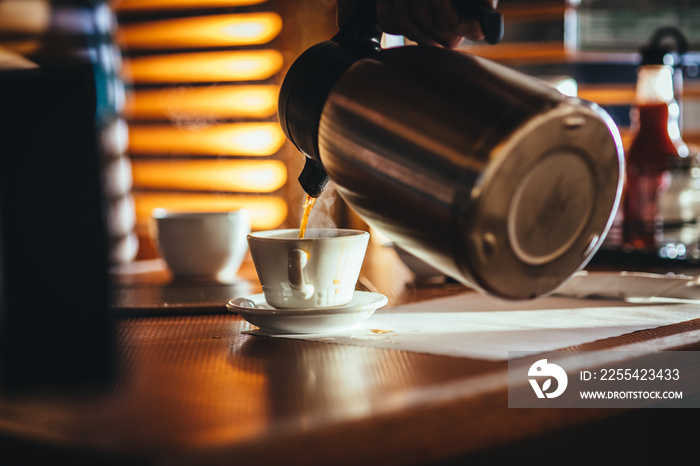 Waitress Pouring Fresh Coffee At A Classic Breakfast Diner