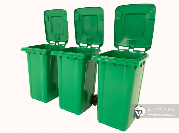 Set of three new unbox green large bins isolated on white background