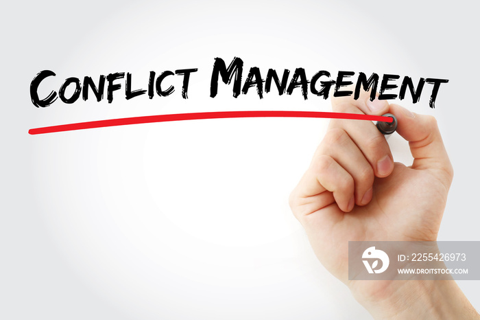 Hand writing conflict management with marker, concept background