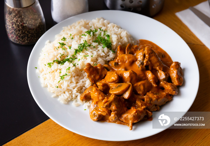 Beef stroganoff with rice. Czech cuisine