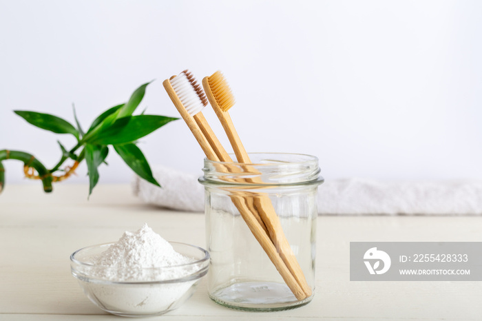 Bamboo toothbrushes, dentifrice tooth powder on white background. Natural bath products, bamboo plant.Biodegradable natural bamboo toothbrush.Eco friendly, Zero waste, Dental care Plastic free concept