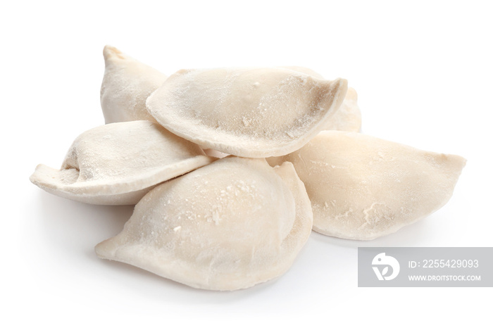 Raw dumplings on white background