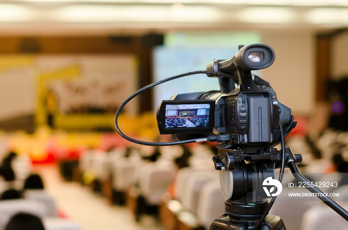 Video Camera recording seminar or learning in Conference room with blurred background, copy space