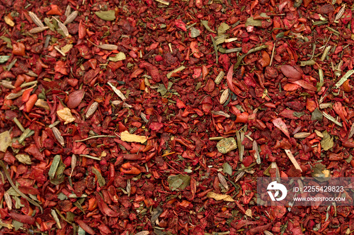 Spices dried paprika spicy herbs on a white background.