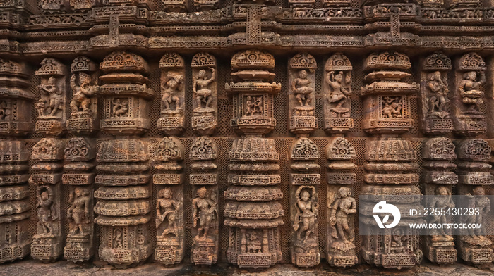 Carvings of  musicians and dancers that almost completely cover the platform, walls and pillars of the hall on Bhoga Mandapa or the dance hall, Sun Temple, Konark, India.