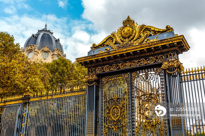 Ornate entrance gate of the Palais de Justice, a courthouse in Ile de la Cite, Paris, France, Europe