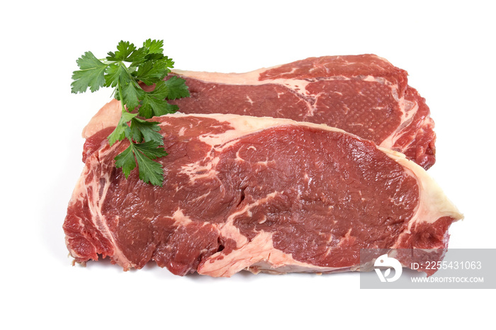 two raw steak on a white background