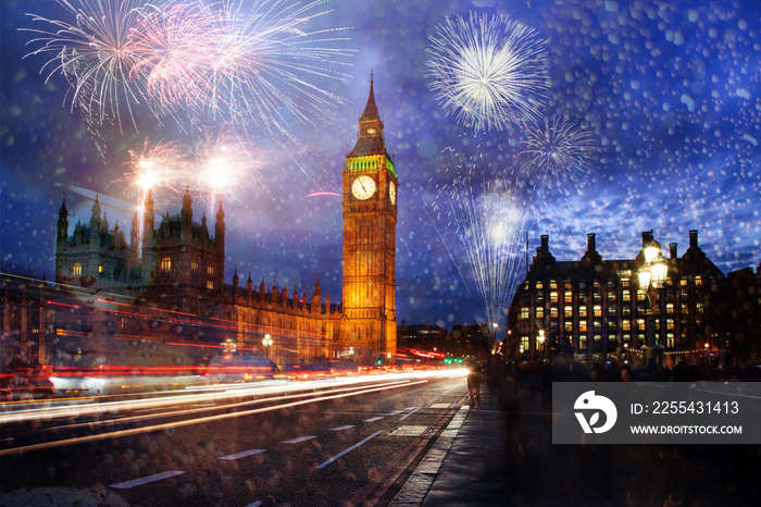 explosive fireworks display fills the sky around Big Ben. New Year’s Eve celebration in the city