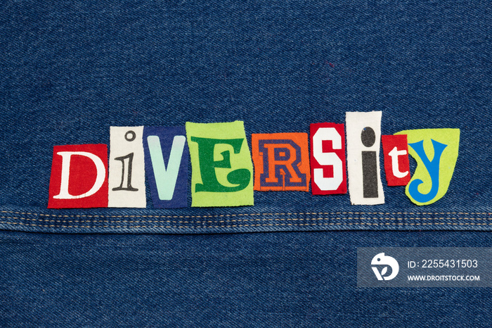 DIVERSITY word collage from cut out tee shirt letters on denim, inclusiveness, horizontal aspect