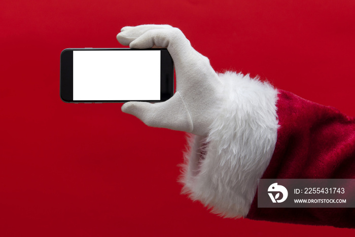 Santa Claus hand holding a smartphone with a blank screen