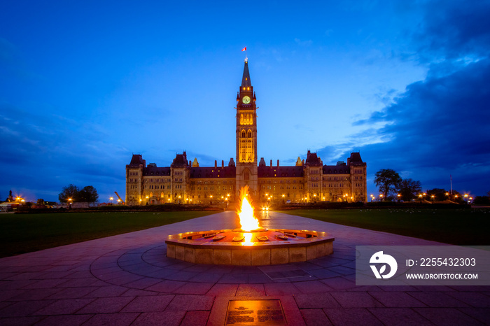 Canada parliament building and centennial flame fountain in Ottawa during blue hour