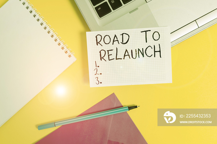 Conceptual hand writing showing Road To Relaunch. Concept meaning In the way to launch again Fresh new start Beginning Laptop marker square sheet spiral notebook color background