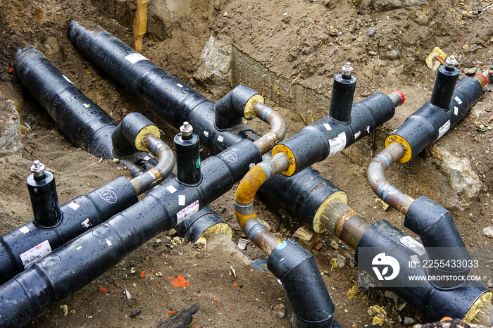 underground heating system pipes replacement on the city street