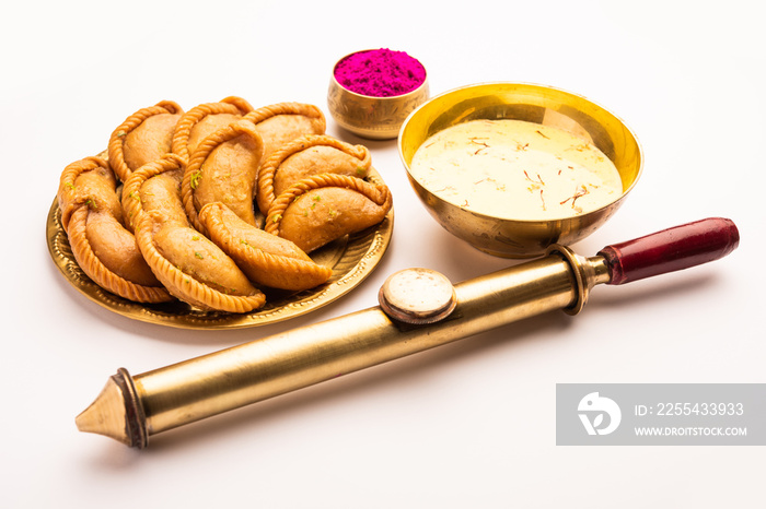 Happy Holi festival greeting with Gujiya, Thandai, pichkari and gulal