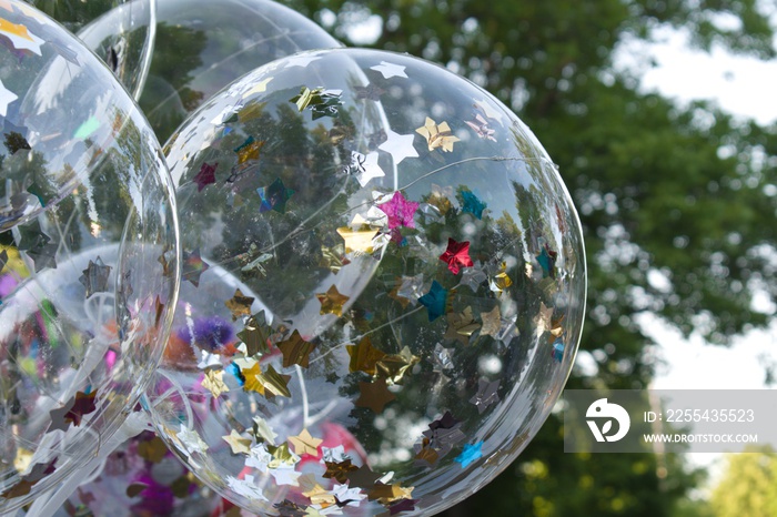 transparent balloons with blurry background