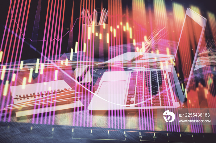 Financial chart drawing and table with computer on background. Multi exposure. Concept of international markets.