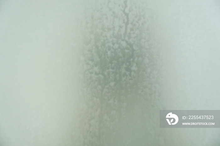 Steam on glass in shower room, blurry steam on mirror in shower room