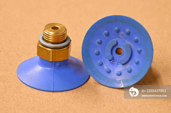 Blue vacuum suction cup in detail.