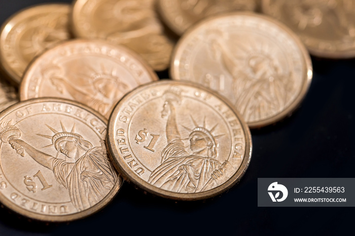 us coin dollar isolated on black background.