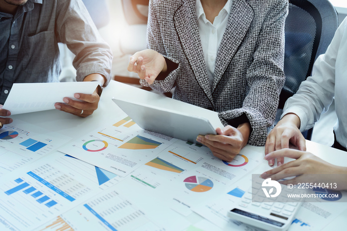 A group of business people working together on a new project to analyze budgets and manage investment risks in today’s profit boosting for marketing in the conference room