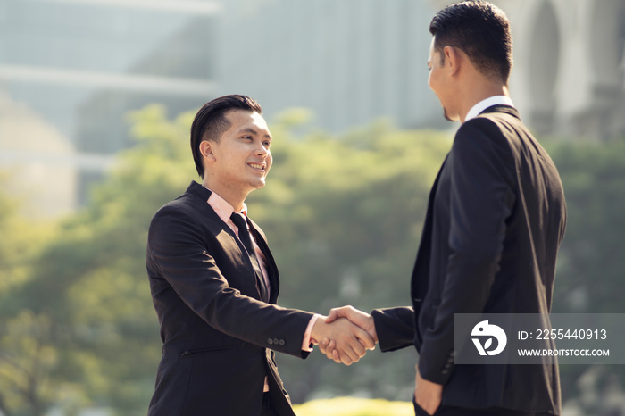 Businessmen handshaking after successful business meeting, negotiation. Business Deal