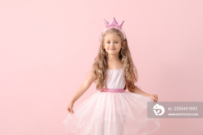 Cute little princess on color background