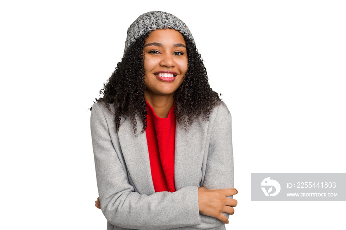 Young african american woman wearing winter jacket isolated laughing and having fun.