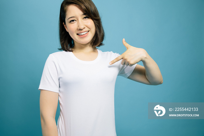 young woman showing plain white T shirt.