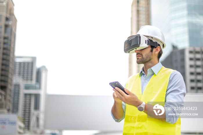 Caucasian man use VR glasses watching video for entertainment, work, free time and study, while hand holding a smartphone for control the VR glasses.