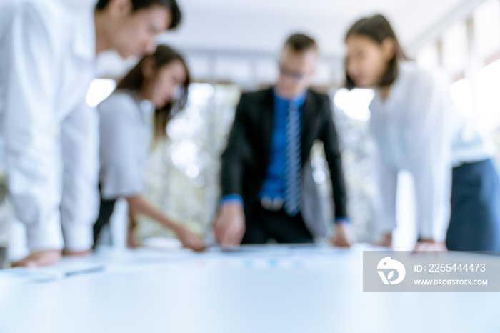 Defocus blur background Young business people are presented marketing work project to the customer in meeting room office