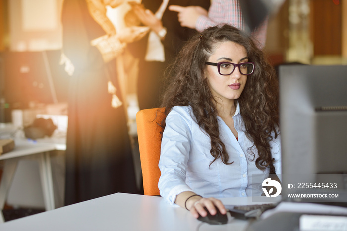 Woman entrepreneur busy with her work in office.